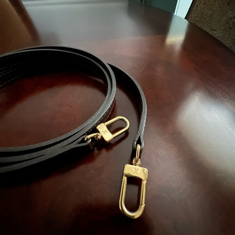 LV brown leather purse strap with LV embossed on hardware